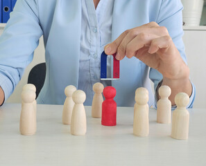 Magnet attracting new talented employees managers and personnel based on recommendations, talent and interview