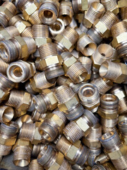 Used brass plumbing fittings ready to be recycled