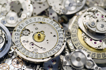Old mechanical watches with gears and cogs. Watch or clock mechanisms