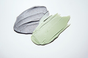 Green cream texture and natural scrub with particles for skin care. Scrub textures. Selfcare trend.
