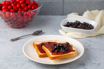 Homemade dogwood cornel jam in glass jar