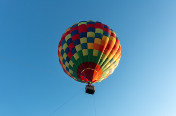 Colorful Muticolor hot air balloon floting in the blue sky.