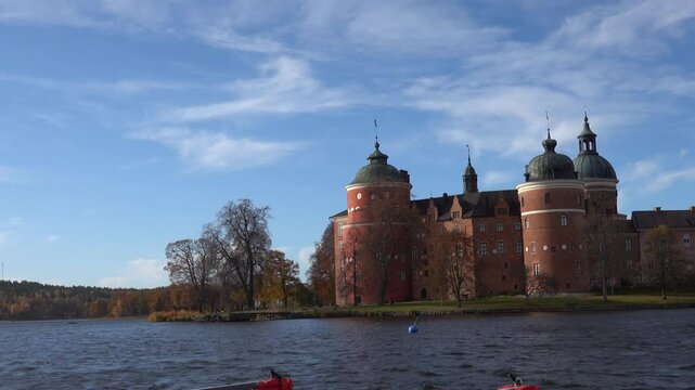 Mariefred, Sweden The Gripsholm Slott or Gripsholm Castle in the harbour on a blustery autumn day. 
