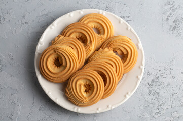 Sweet and tasty round butter cookies. Round ring shaped German spritz biscuits