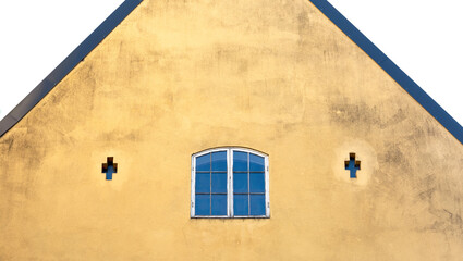 ventanas en forma de cruz en el muro amarillo