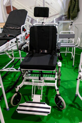 A gurney chair for transporting patients with soft pads