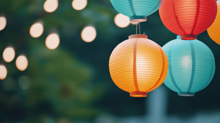 Fototapeta premium Colorful lanterns illuminating a festive atmosphere with soft glows and vibrant hues in an outdoor setting