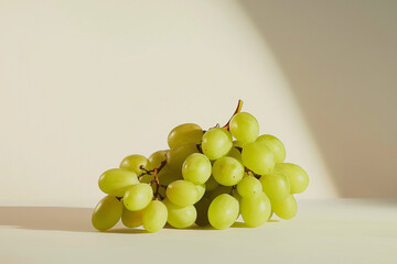 Bunch of grapes are on a table.