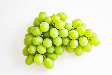 Bunch of green grapes on a white background.