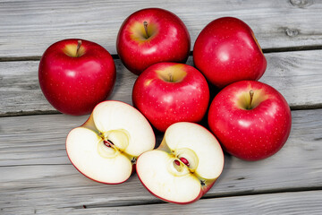 Red apple with a bite taken out of it.