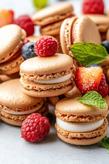 Fototapeta premium Delightful macarons with fresh berries and mint a gourmet treat for every occasion