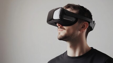 A man wearing virtual reality goggles, experiencing immersive technology in a modern environment.