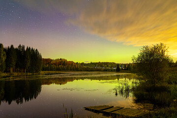 Green glow over the pond