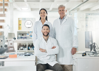 Fototapeta premium Portrait, men and women in laboratory with confidence, smile and collaboration for medical research. Scientist, teamwork and group of doctors with arms crossed, pride and pharmaceutical engineering
