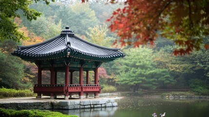 Obraz premium Serene Pavilion Overlooking Calm Water in Autumn