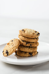 chocolate chip cookies on a white plate