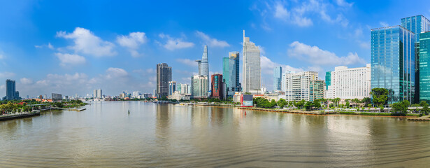 Panorama of Ho Chi Minh City, Vietnam seen from the other side of the Saigon River. This is the largest city and has the largest economy in Vietnam and is located in the south of the country.