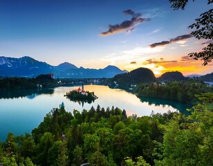 Naklejka premium Lake Bled with St Marys church on the small island and stunning sunset,Bled,Slovenia,Europe