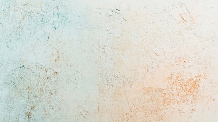 Fototapeta premium A textured abstract background featuring soft gradients and subtle imperfections in light blue and beige tones.