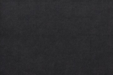 Fototapeta premium Faded black denim fabric with a worn vintage look and slight texture, AI Generated