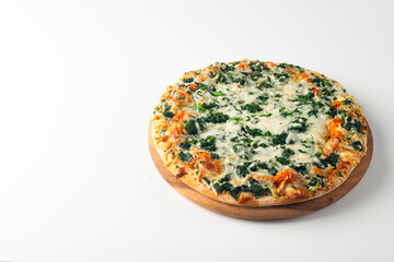 Vegetarian pizza with spinach, arugula, pesto, cheese and parmesan. Italian cuisine. 