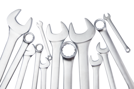 Spanners and wrenches isolated on white background. Close up. Top view.