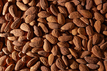 Scattered Almonds. Background from Almond Nuts. Natural High-Calorie Snacks