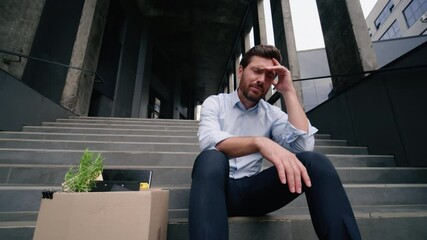 Pensive business man suffer bad work lost intern problem financial crisis dismissed job burnout male sitting stairs sad Caucasian businessman unemployment middle-aged fired guy in city dismissal box