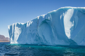 View of glaciers and icebergs in the fjords of South Greenland.