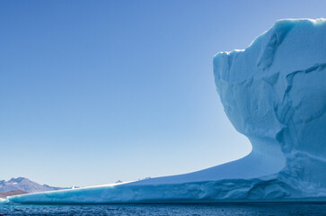 View of glaciers and icebergs in the fjords of South Greenland.