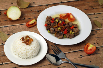 Delicious Beef and Rice Dish on a Wooden Table