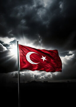 Turkish Flag waving in a sky with dark clouds. Translate: Karanlık koyu bulutların olduğu bir g&ouml;ky&uuml;z&uuml;nde dalgalanan T&uuml;rk Bayrağı