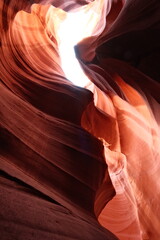 Stunning landscape of Antelope Canyon in Arizona, showcasing its sandstone formations carved by water and wind, creating breathtaking curves and textures.