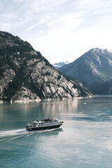 Breathtaking Alaskan scenery, featuring vast wilderness, towering mountains, glaciers, and pristine rivers, capturing the rugged beauty of nature in the Last Frontier.