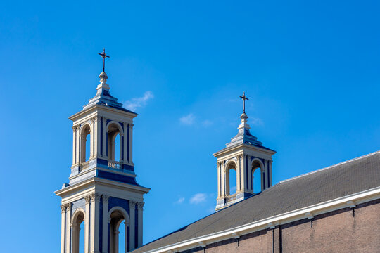 The roof top and two towers of the Moses and Aaron Church in the Waterlooplein neighborhood of Amsterdam, The Roman Catholic Church of St. Anthony of Padua known as the Mozes en A&auml;ronkerk, Netherlands