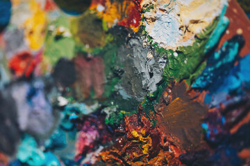 color paint palette texture as very nice background. oil paints on an artist's palette. 