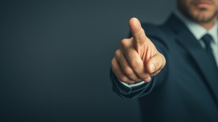 Authoritative Gesture Close-Up of Man's Pointing Finger in Blue Suit, Leadership Concept
