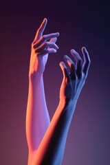 Obraz premium Reaching for the Light: A pair of hands, bathed in vibrant neon blue and pink light, reach up towards the sky. The image evokes a sense of hope, aspiration, and the pursuit of dreams.