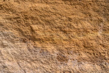 Colourful rocks in the cliff face at Burriana beach Nerja Spain