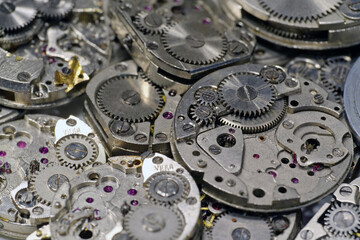 Old mechanical watches with gears and cogs. Watch or clock mechanisms