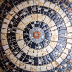 Fototapeta premium Stone Mosaic: A flatlay photo of an artistic stone mosaic, showcasing a variety of stones arranged in a geometric pattern, captured in macro detail with soft focus to emphasize the textures and colors