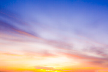 Obraz premium Clouds and sky background,Beautiful Vivid sky painted by the sun leaving bright golden shades