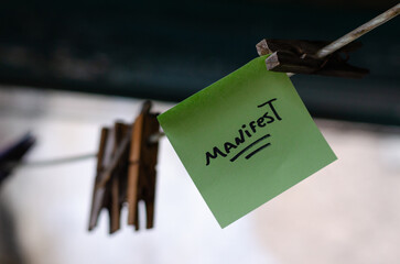 Motivational Word In A Green Square Paper Outdoor Composition