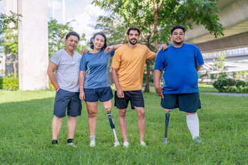 portrait multiracial group of friends gathering in the park,athletic persons with prosthetic leg with friends while exercising outdoors,people lifestyle,friendship