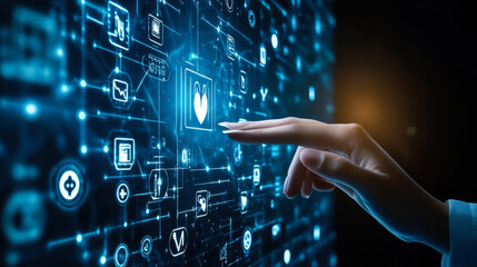 A hand reaching toward a glowing digital interface filled with dynamic blue technology symbols in a dark environment