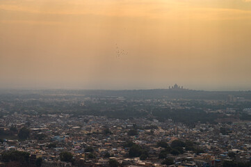 Fototapeta premium Beautiful top view of Jodhpur city from Mehrangarh fort, Rajasthan, India. Jodhpur is called Blue city since Hindu Brahmis there worship Lord Shiva, whose colour is blue, they painted houses in blue.
