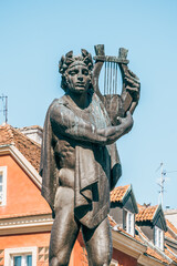 Historical Statue at Stary Rynek Square in Poznań, Poland, with a Beautiful Blue Sky © explorateurphotos