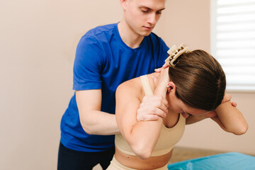 Osteopathy to heal back and shoulder injury. Doing physiotherapy to overcome physical trauma....