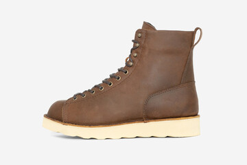 Brown leather boots isolated on white background. Durable and stylish footwear for outdoor, hiking, casual wear, perfect for autumn and winter seasons