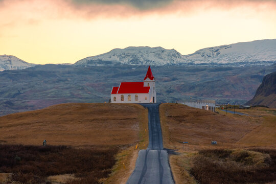 Perspective with Ingjaldsholskirkja Church at the end of the road,  Iceland